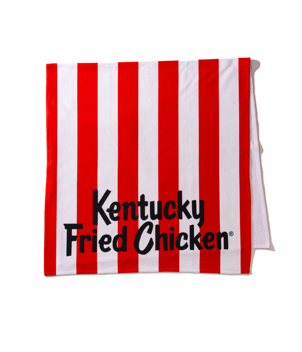 red and white striped KFC towel with black wording 'Kentucky Fried Chicken'