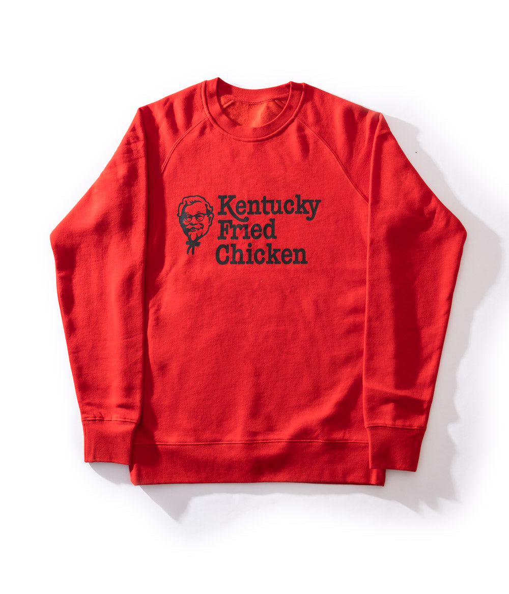 Red KFC crew neck jumper with black Kentucky Fried Chicken message