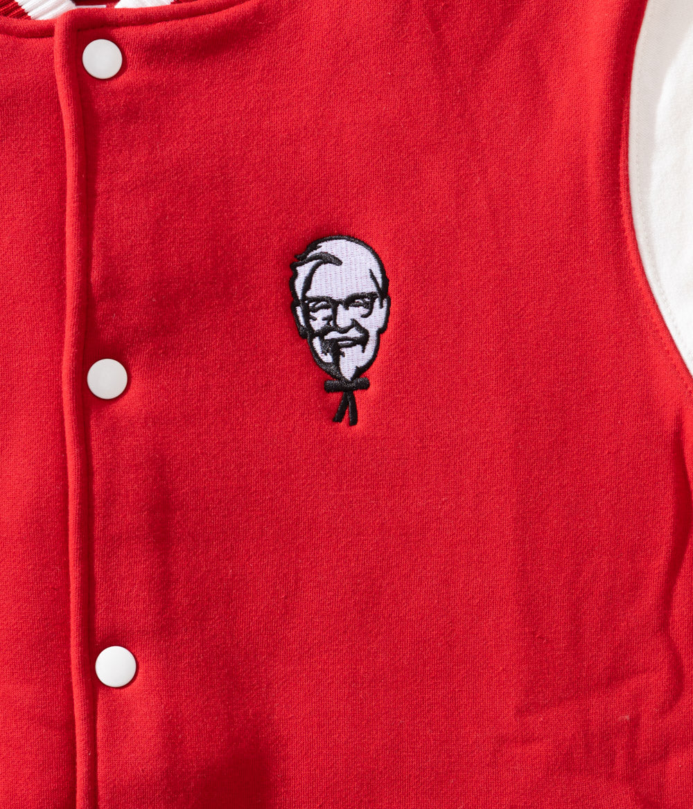 close up view of Red KFC bomber jacket with off white sleeves and KFC colonel sanders logo