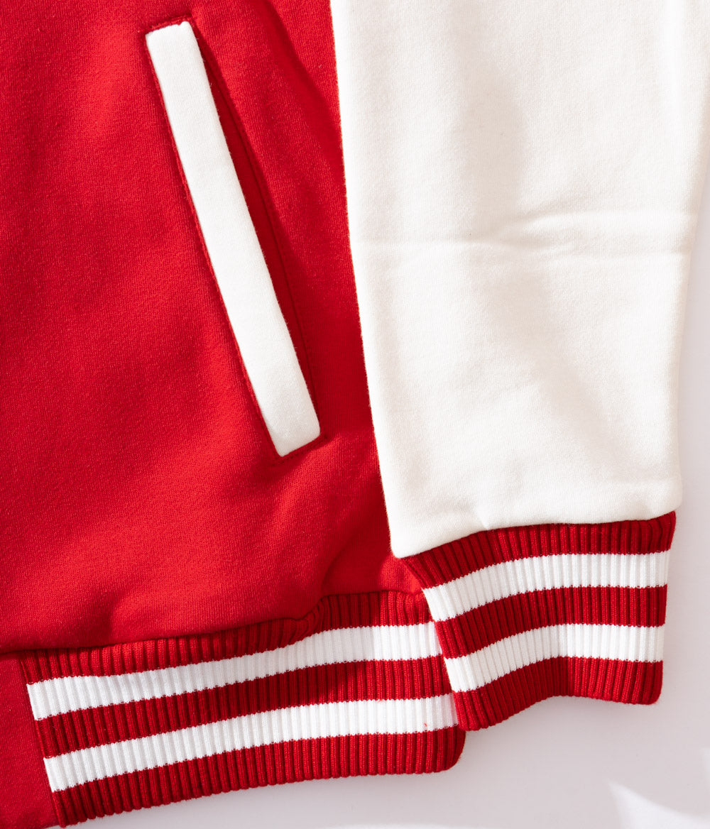 close up view of Red KFC bomber jacket with off white sleeves