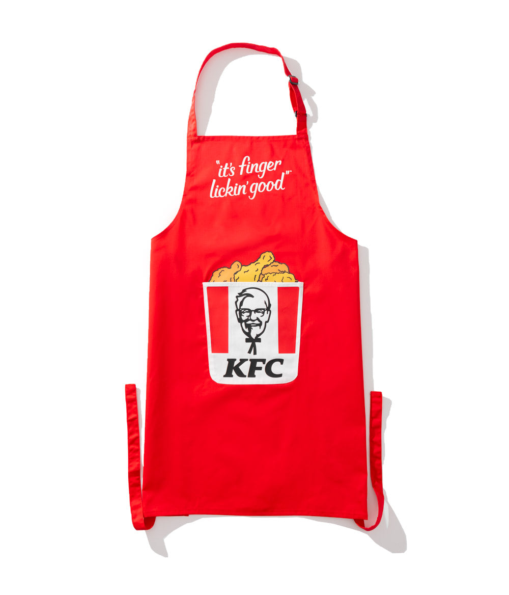 red KFC branded apron with colonel Sanders but and tagline 'It's finger lickin' good'