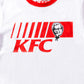 close up view of KFC logo and colonel on white tee shirt