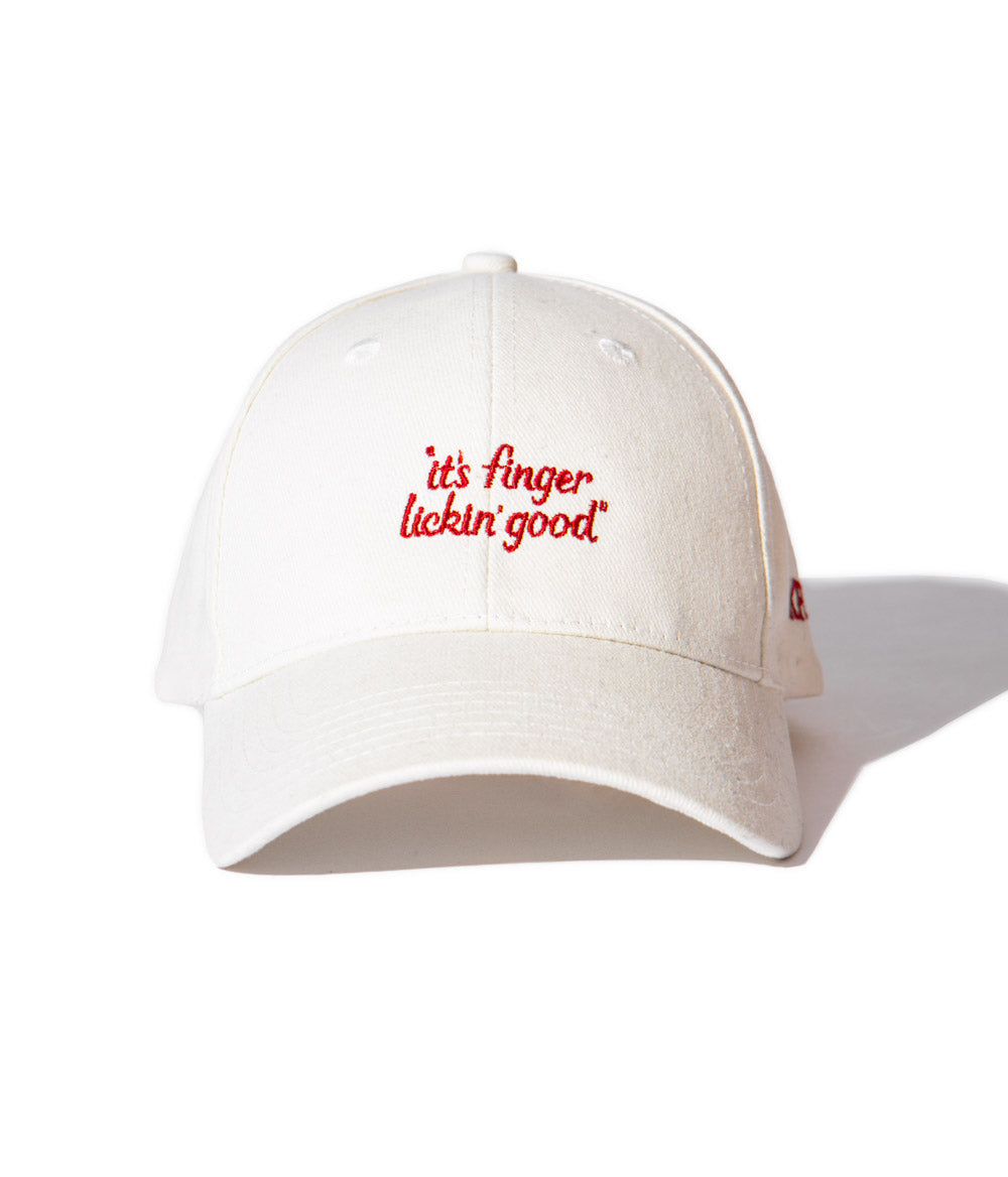 front on view of KFC off-white cap with red message of 'it's finger lickin good' and KFC logo