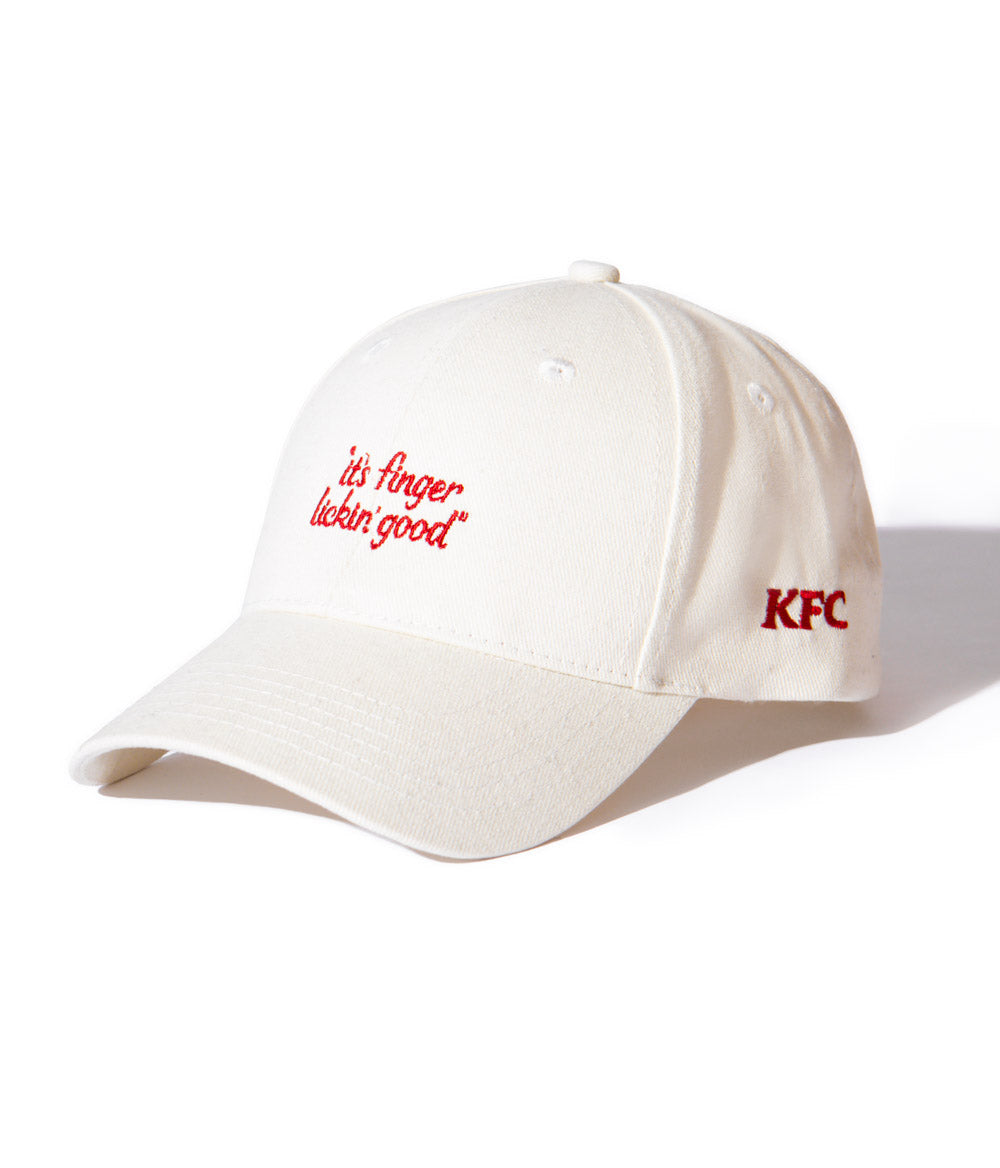 side view of KFC off-white cap with red message of 'it's finger lickin good' and KFC logo