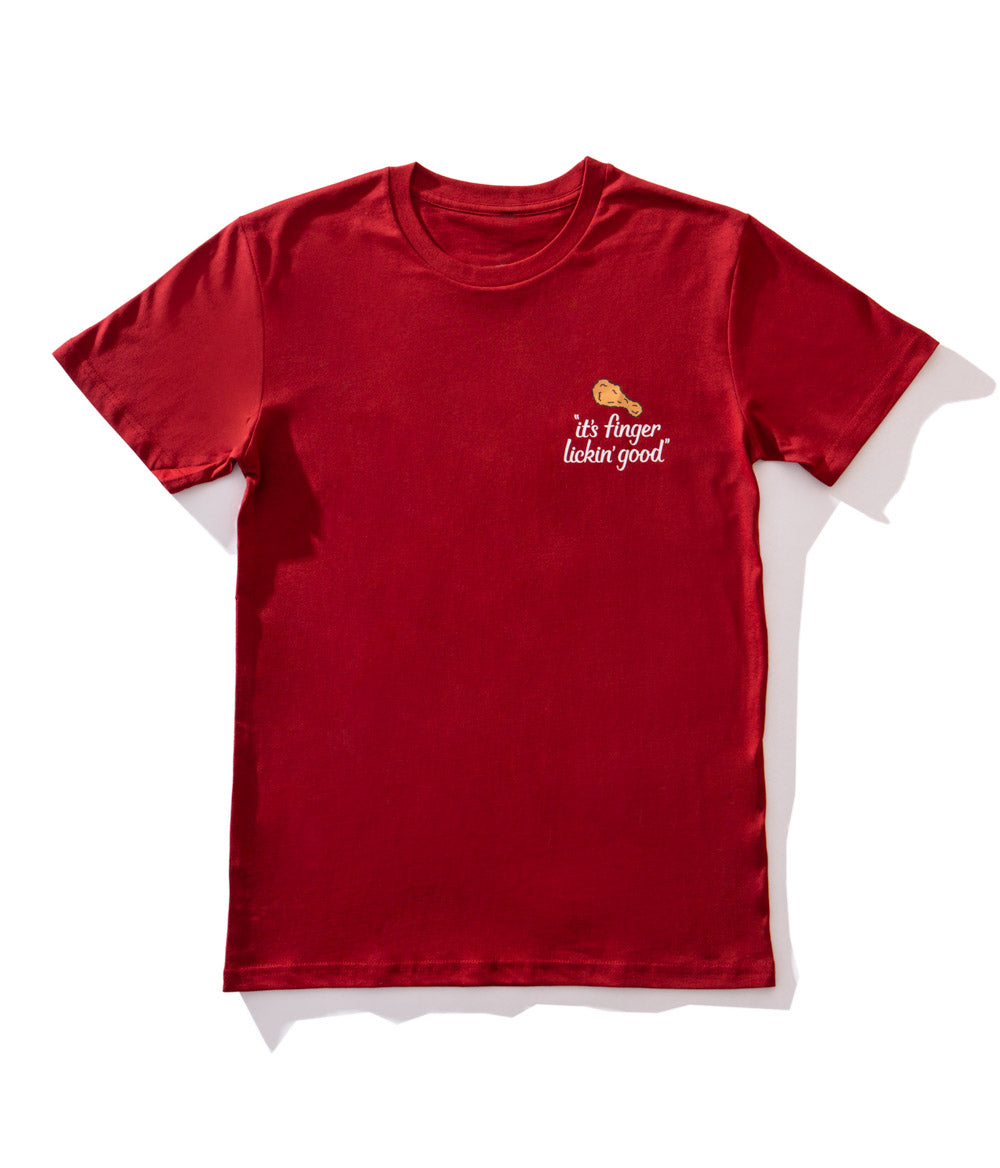 KFC red tee shirt with chicken drumstick and 'it's finger lickin' good' branding 