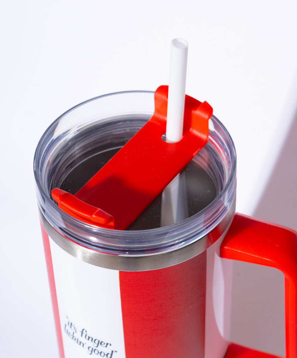 Close up of KFC red and white striped tumbler