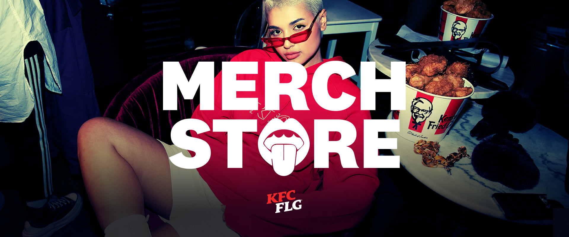Person wearing a KFC shirt with 'MERCH STORE' text and KFC branding.