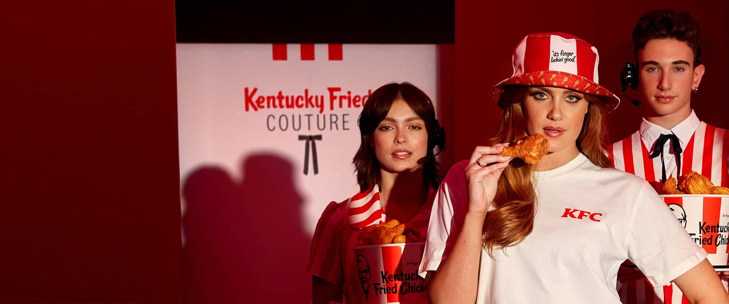 3 KFC models wearing KFC merchandise and holding KFC food