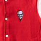 close up view of Red KFC bomber jacket with off white sleeves and KFC colonel sanders logo