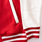 close up view of Red KFC bomber jacket with off white sleeves 