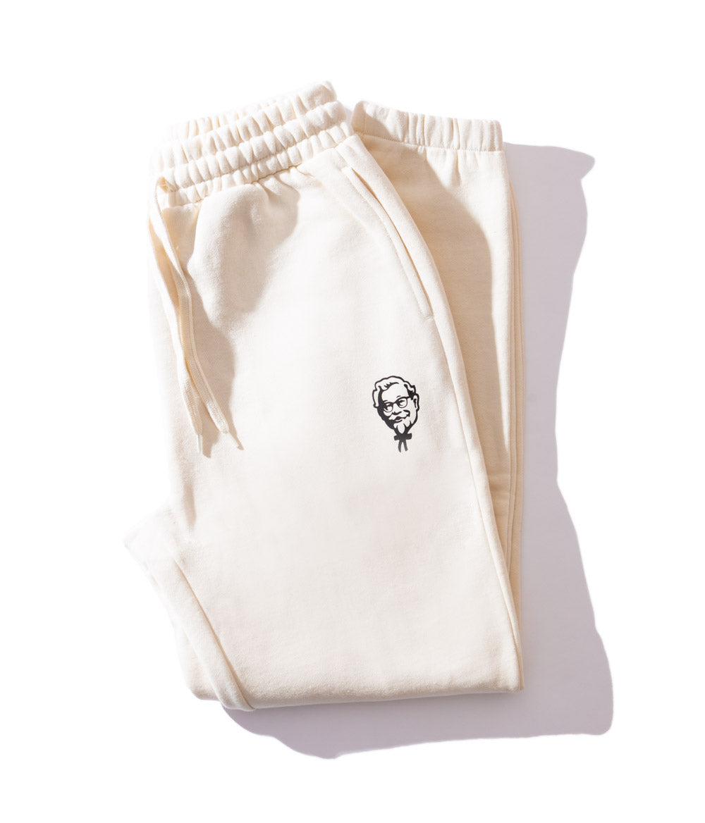 folded over off-white track pants with black logo of colonel sanders